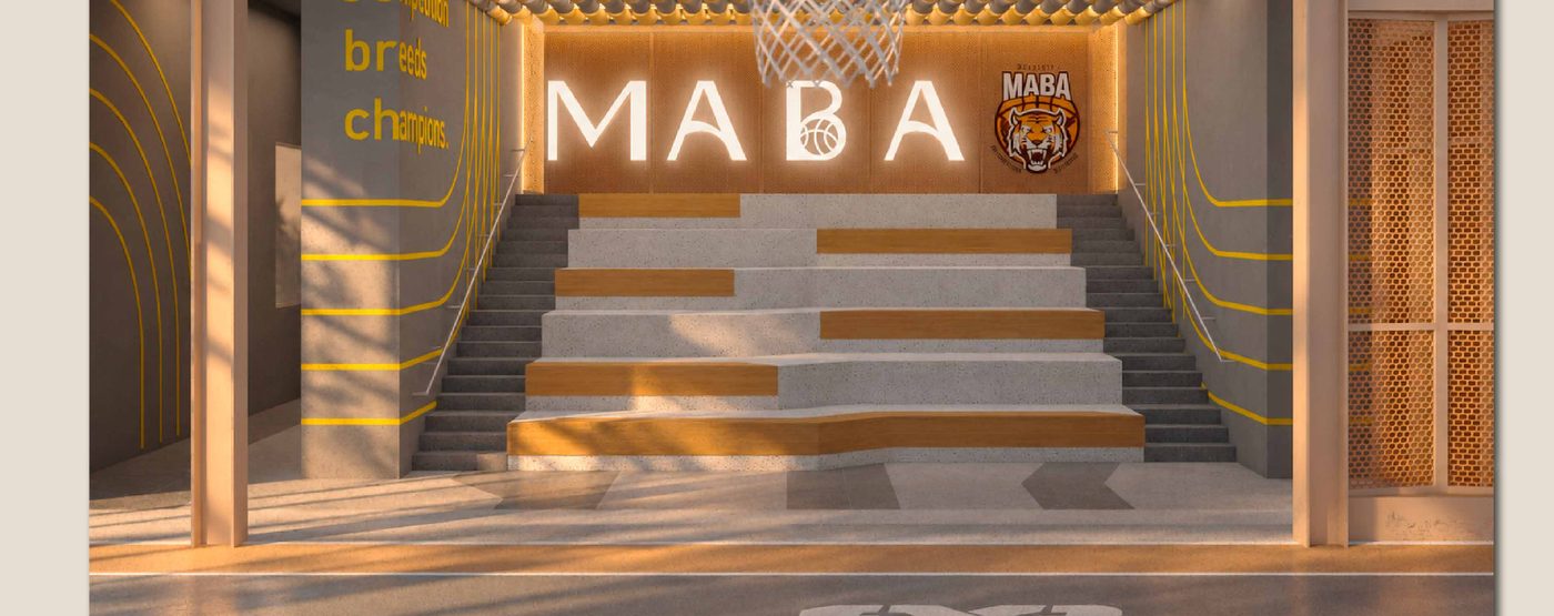 The MABA 3 on 3 basketball court on Level 6, with tiered seating and the association's branding