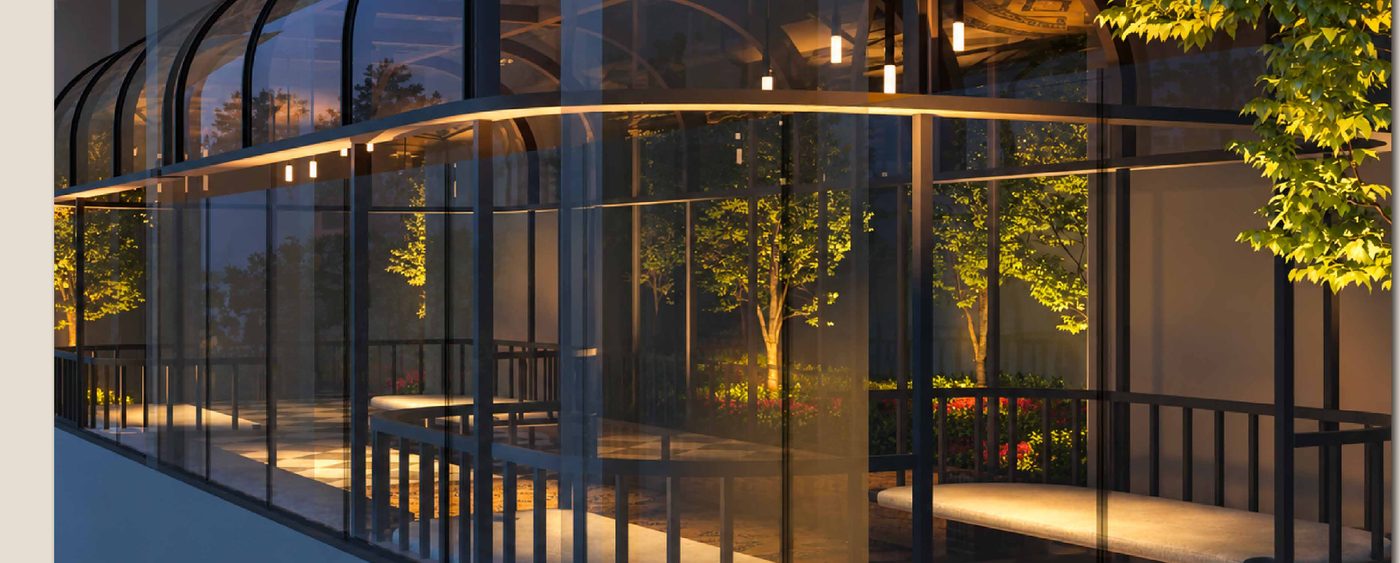 The Loft Lounge on Level 53A, a glazed pavilion among trees at blue hour